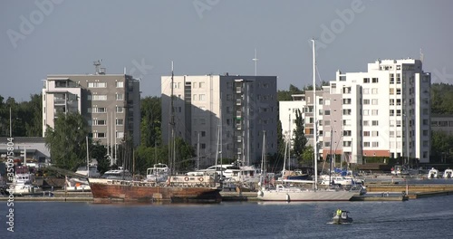 4K Baltic Sea Finnish Bay lagoon summer morning harbour video, Kotka port and town over calm water channel in Finland, northern Europe photo