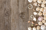 Fresh mushrooms are spread out on a wooden table. Template for text, top view.