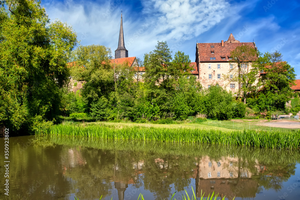 View to the Hinterburg with pond in Schlitz, Hesse, Germany View to the Hinterburg with pond in Schlitz, Hesse, Germany