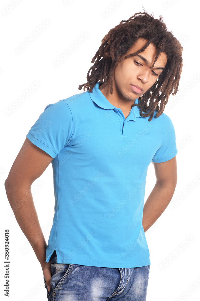 handsome young man posing against white background handsome young man posing against white background