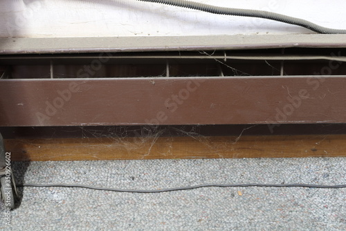 Extremely dirty electric baseboard heater in need of maintenance
 photo