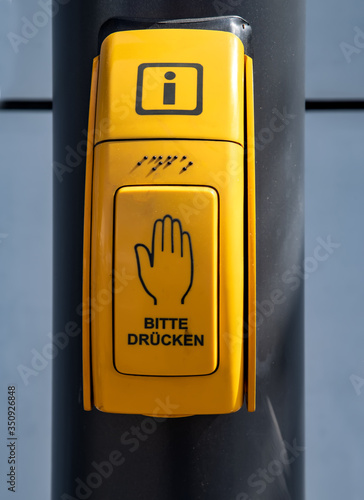 Button of a pedestrian push button traffic light system