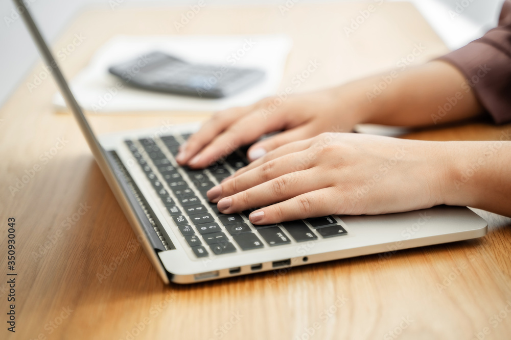 Business sales consultant working in data documents at modern office. Business sales consultant working in data documents at modern office.