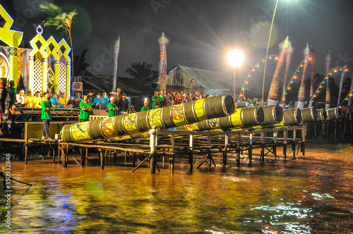 Meriam Karbit is a traditional cannon made of bamboo wood at Kapuas River Pontianak photo