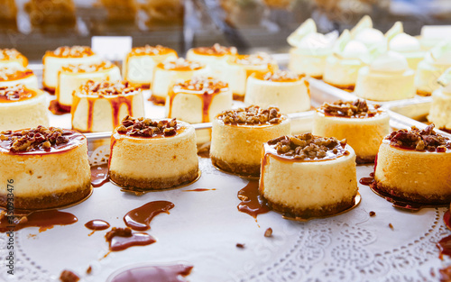 Vanilla Cheesecake pie desserts with caramel and walnut topping reflex