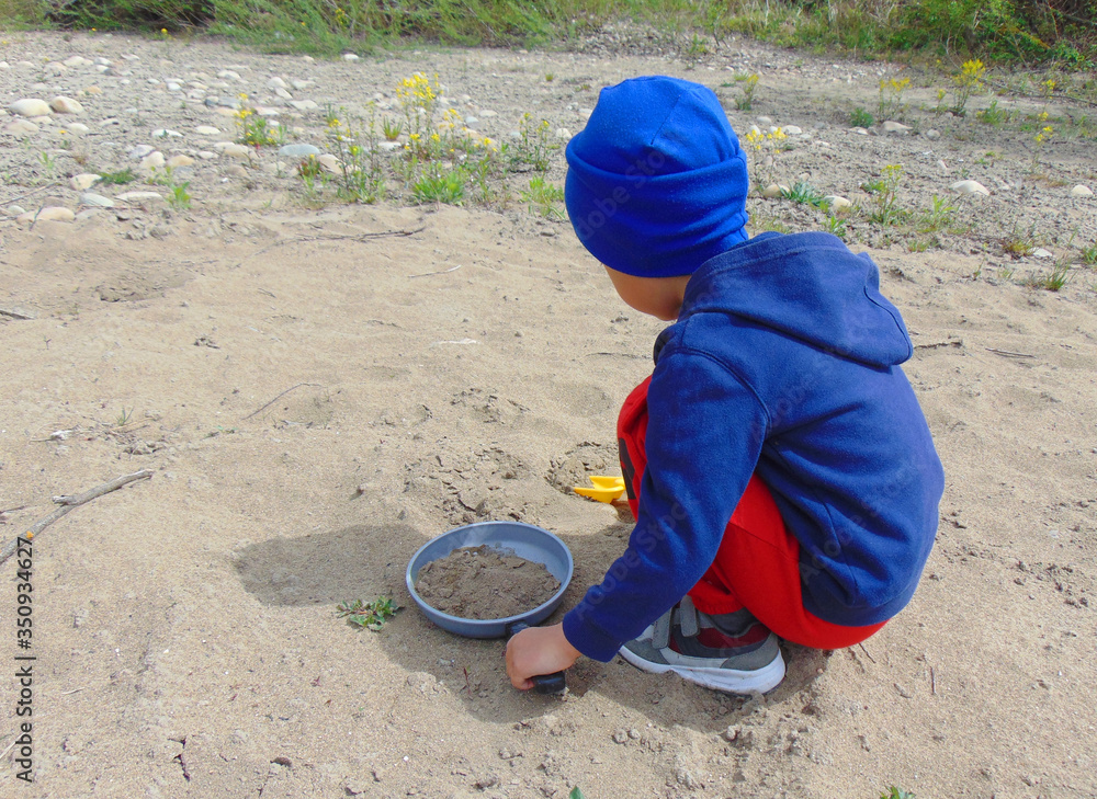 little boy playing on the beach little boy playing on the beach