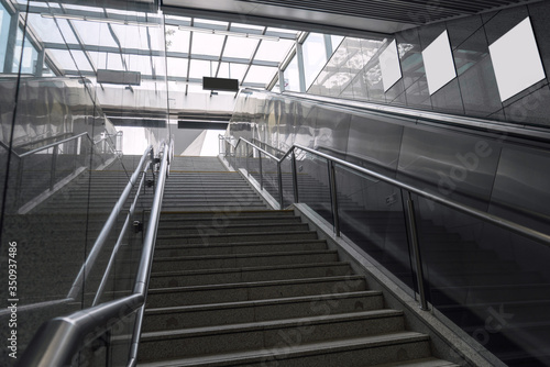 Canvas Print The stairs in the subway, entrance to ground.