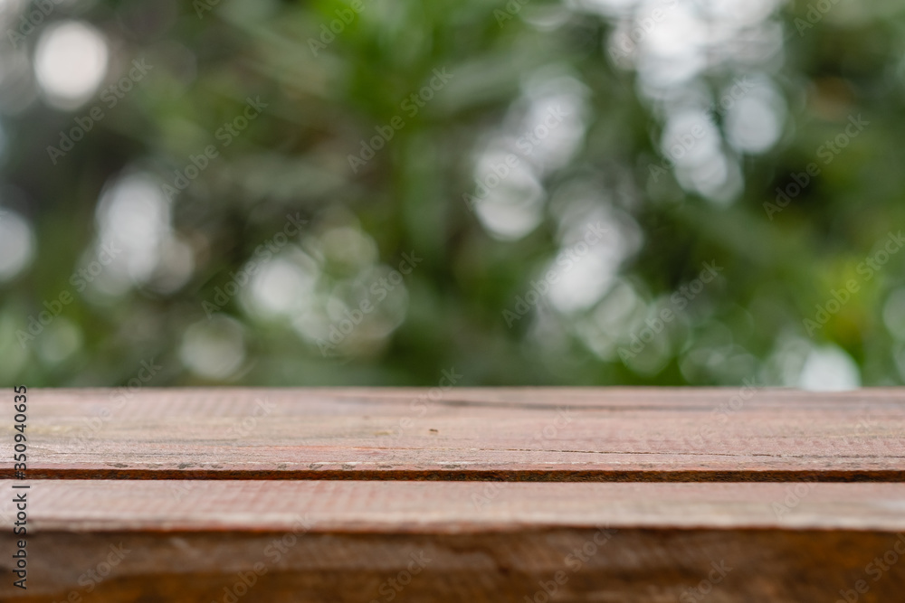 wooden table in nature in summer. close-up, space for text wooden table in nature in summer. close-up, space for text