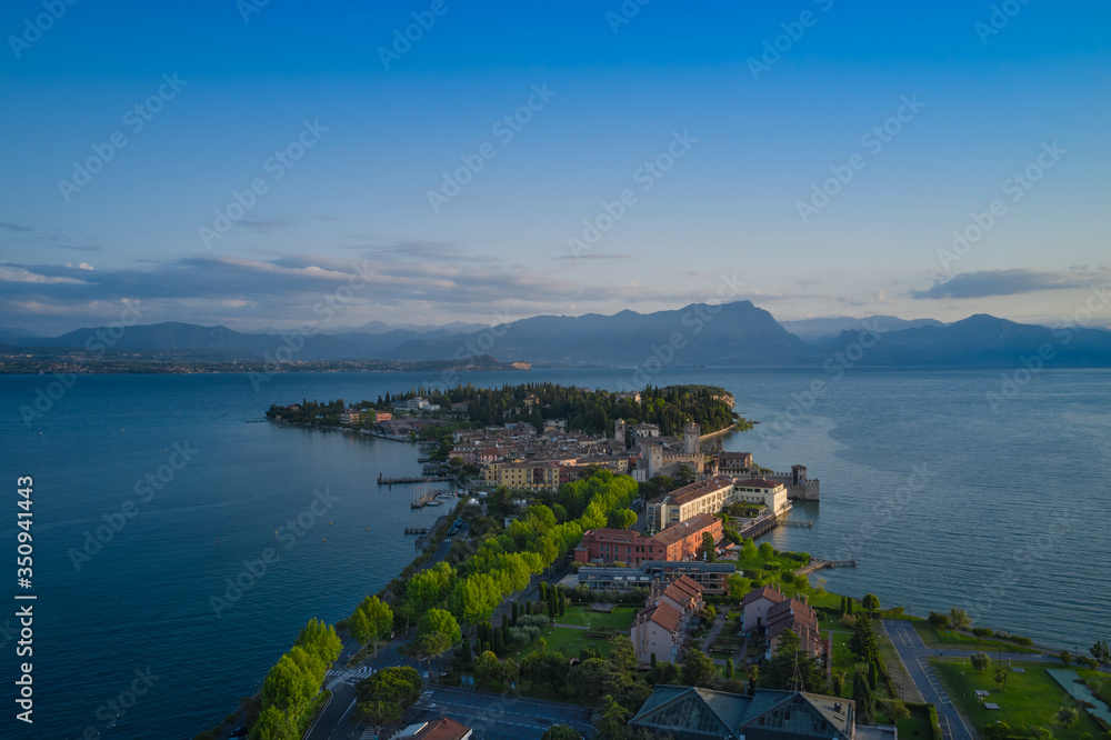Sirmione city, Italy. Lake Garda. Early morning aerial view