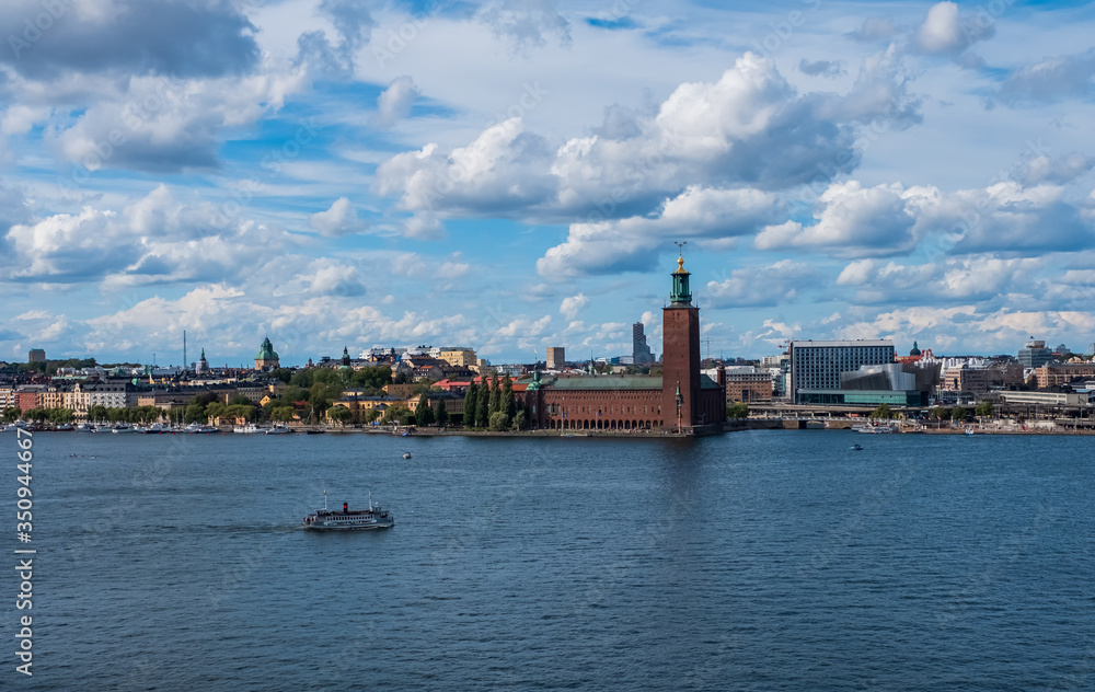 Fototapeta premium Scenic summer view of the City Hall castle in the Old Town Gamla Stan in Stockholm, Sweden. August 2018