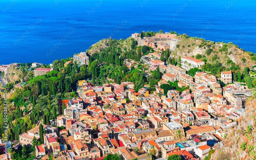 Cityscape in Taormina and Mediterrenean sea Sicily reflex