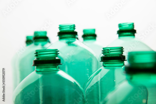 Close up of green plastic water bottles. Household recycling