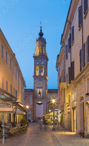 PARMA, ITALY - APRIL 18, 2018: The street of the old town at dusk.