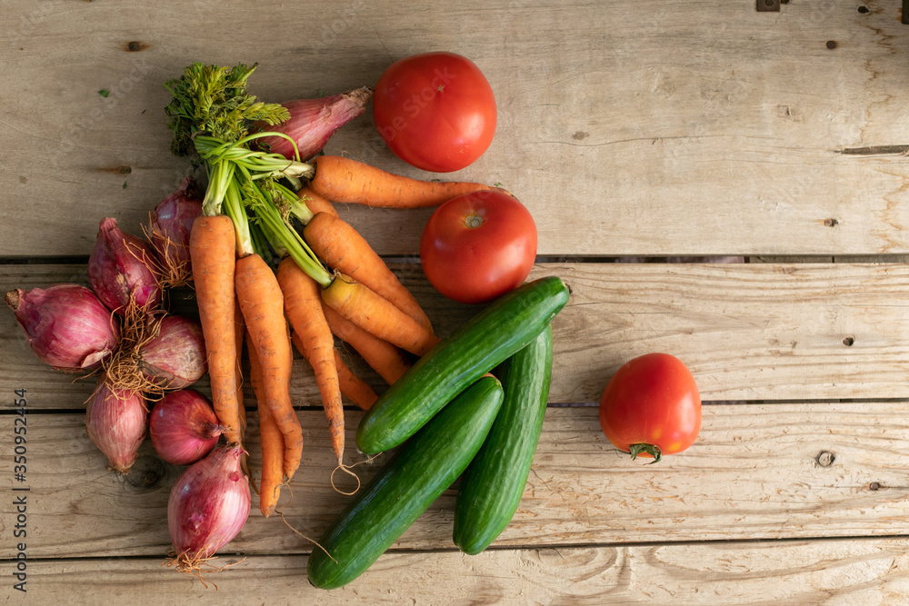 Vegetables on a wooden background Vegetables on a wooden background