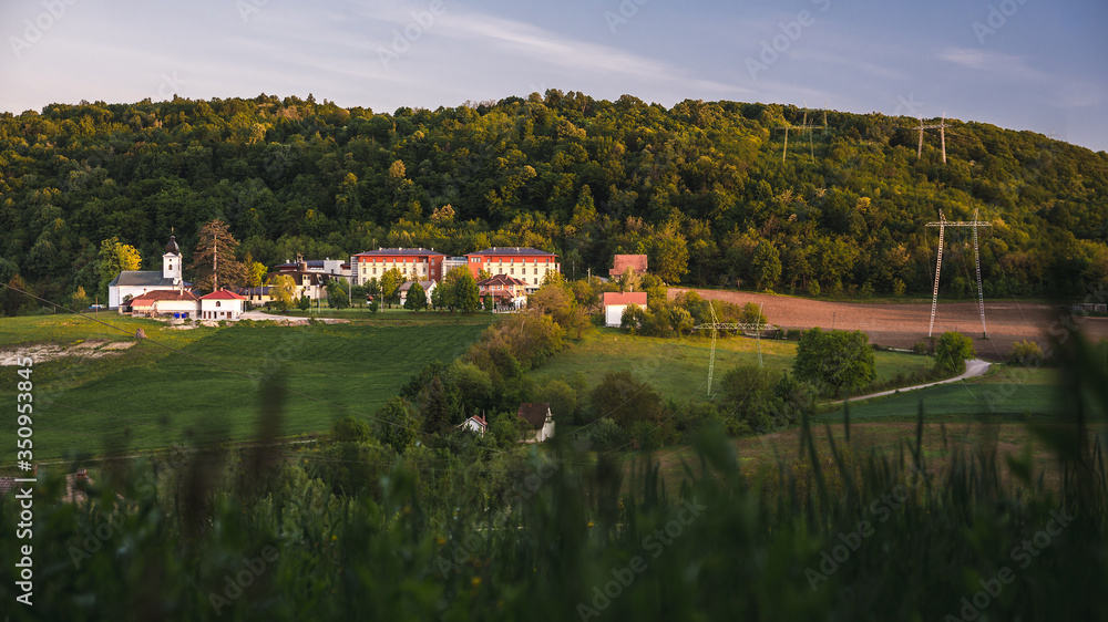 Obraz premium Research facility and church on a hill in Petnica village near city of Valjevo in western Serbia