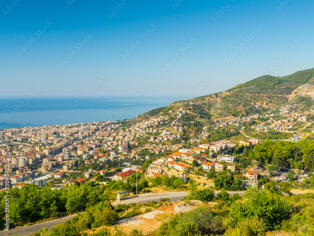 Alanya, Turkey. Beautiful view new houses on the mountain. Real estate. Vacation postcard background