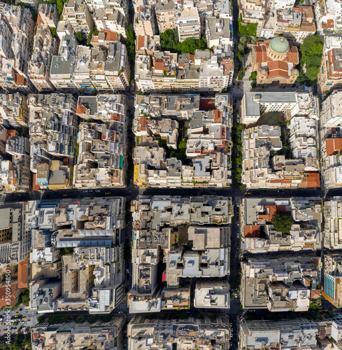 Aerial top down view of streets and buildings pattern in Athens, Greece