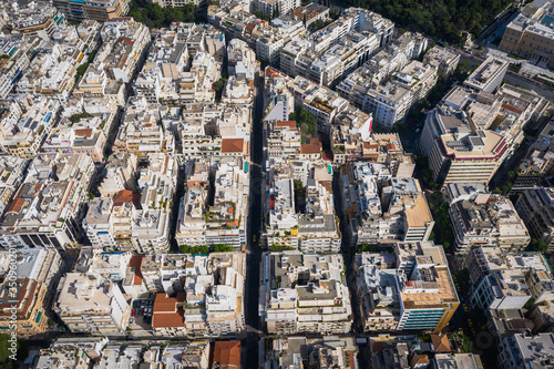 Fototapeta Naklejka Na Ścianę i Meble -  Aerial top down view of streets and buildings pattern in Athens, Greece