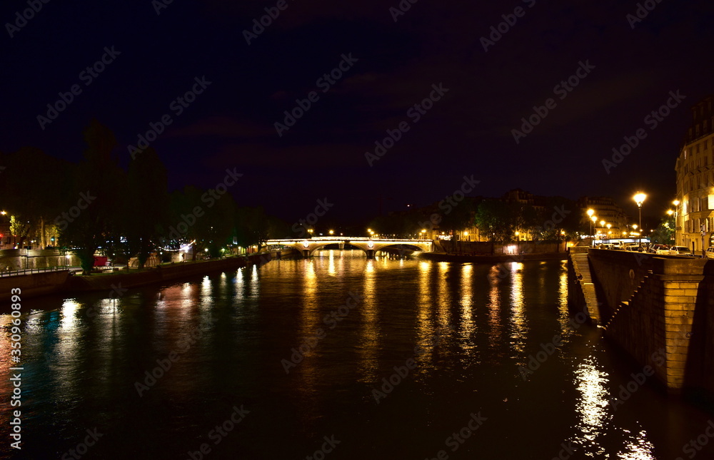 Pont Louis-Philippe and Seine River at night. Paris, France.