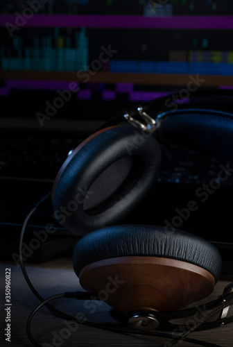 Hi-Fi headphones and computer in a home-studio audio recording and producing (ID: 350960822)