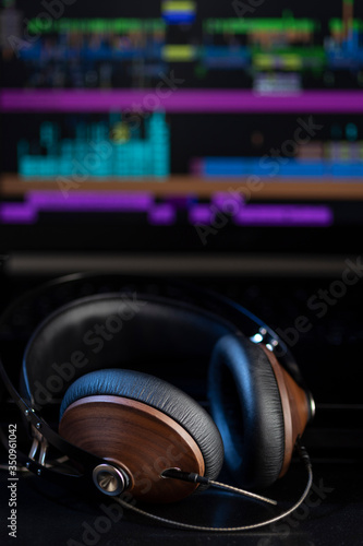 Hi-Fi headphones and computer in a home-studio audio recording and producing (ID: 350961042)
