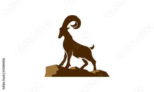 goat mountain stand on rocks for logo design, goat vector on the rock, goat symbol illustration on white background