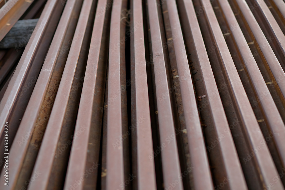 Stack of Iron rusty rails for the railway Stack of Iron rusty rails for the railway