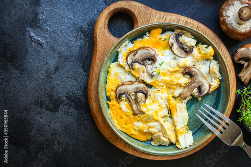 scramble fried eggs
omelet mushrooms
Menu concept healthy eating. food background top view copy space for text
keto or paleo