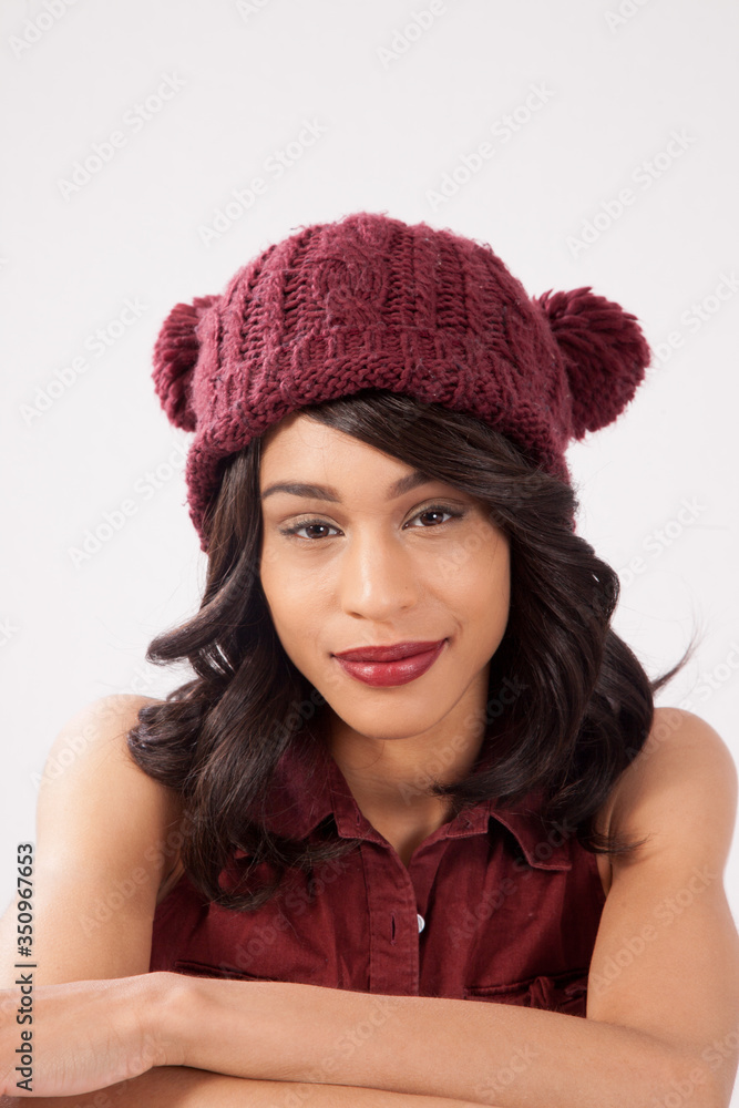 Pleased woman in a red knit cap Pleased woman in a red knit cap