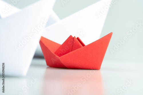 Free Download Small business, Business competition concept with red paper ship on white background - GFXLoad
