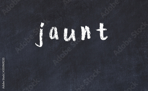 Фотография College chalk desk with the word jaunt written on in