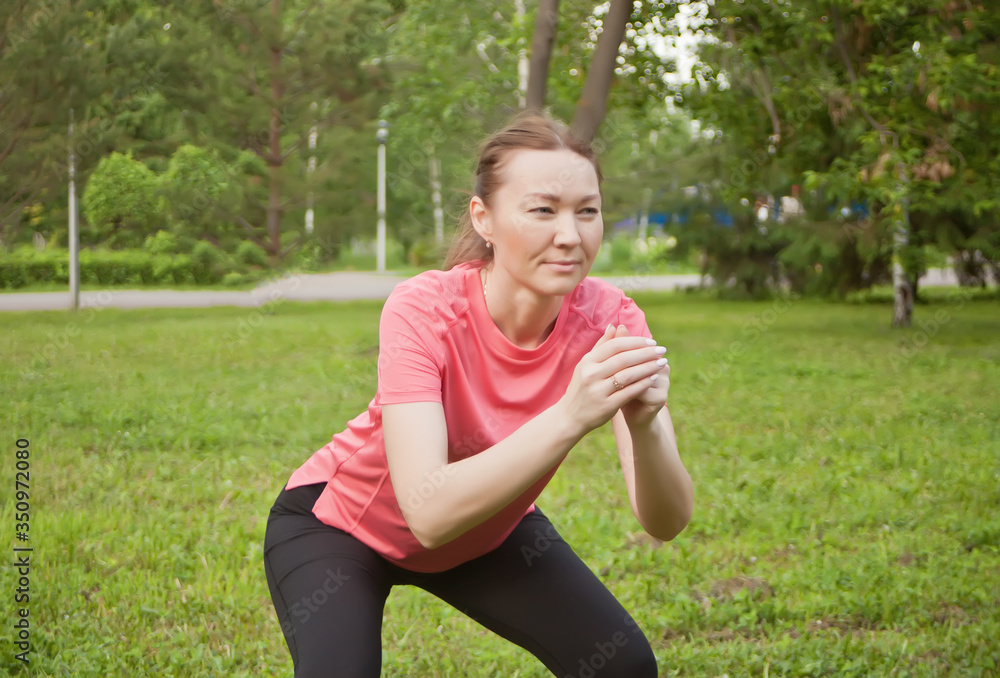 Active sporty caucasian woman training outdoors in the park Active sporty caucasian woman training outdoors in the park
