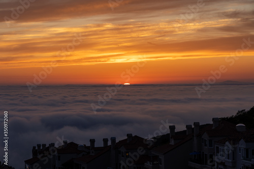 Sunset over the clouds in Laguna Beach California © Isaac Gindi