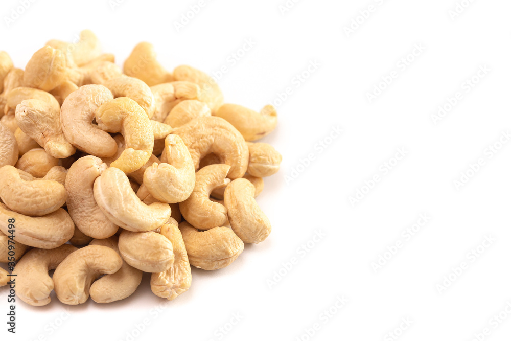 A Pile of Raw Natural Cashew Nuts Isolated on a White Background A Pile of Raw Natural Cashew Nuts Isolated on a White Background
