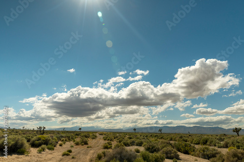 sun and clouds in the mojave desert