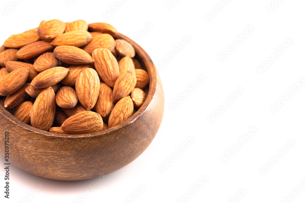 Bowl Full of Raw Natural Almonds Isolated on a White Background Bowl Full of Raw Natural Almonds Isolated on a White Background