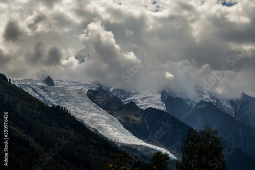 Glacier des Bossons viewed from Chamonix in a cloudy day of september. Mont Blanc Massif, French Alps, Chamonix, Bosson Glacier, France, Europe. © sebastianosecondi