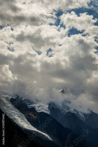 Glacier des Bossons viewed from Chamonix in a cloudy day of september. Mont Blanc Massif  French Alps  Chamonix  Bosson Glacier  France  Europe.