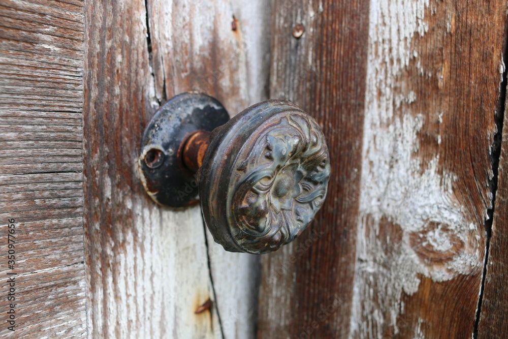 Detailed Antique Door Knob with Distressed Wood Detailed Antique Door Knob with Distressed Wood