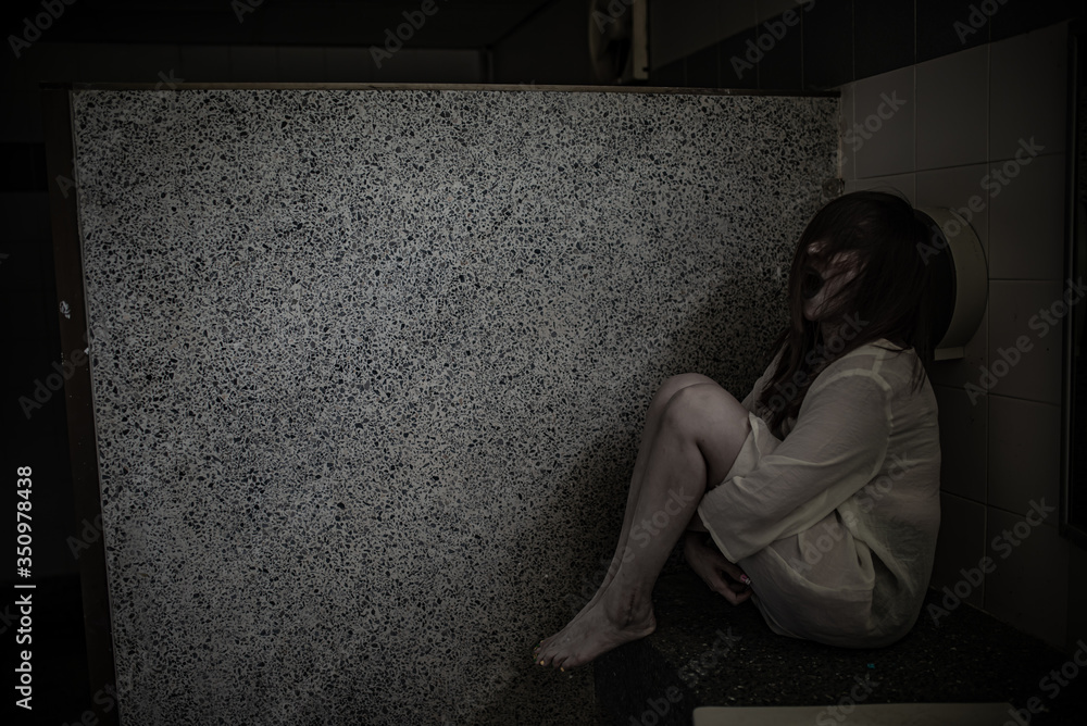 Portrait of asian woman make up ghost face,Horror scene,Scary background,Halloween poster Portrait of asian woman make up ghost face,Horror scene,Scary background,Halloween poster