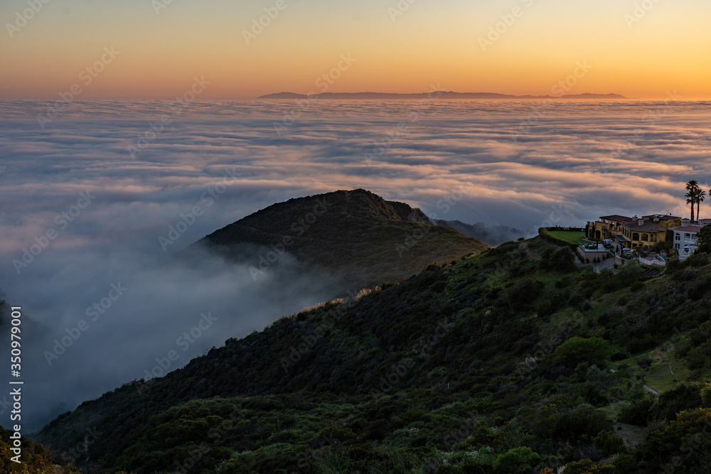 Naklejka premium sunset over the clouds catalina laguna beach california