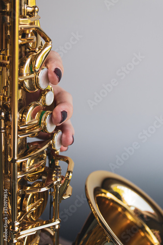 Photography Saxophone girl player hands