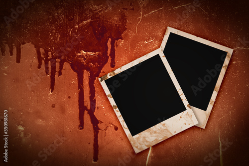 photo frames on bloody grunge background © Sergii