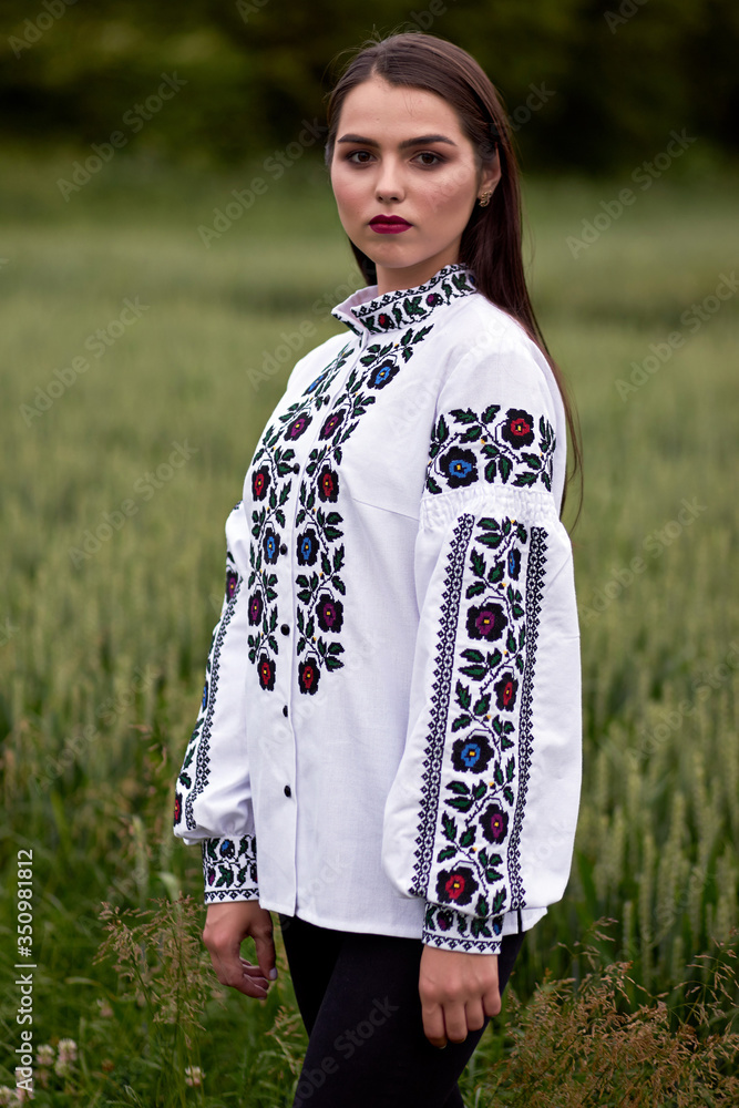 Ukrainian girl in traditional Ukrainian clothes Ukrainian girl in traditional Ukrainian clothes