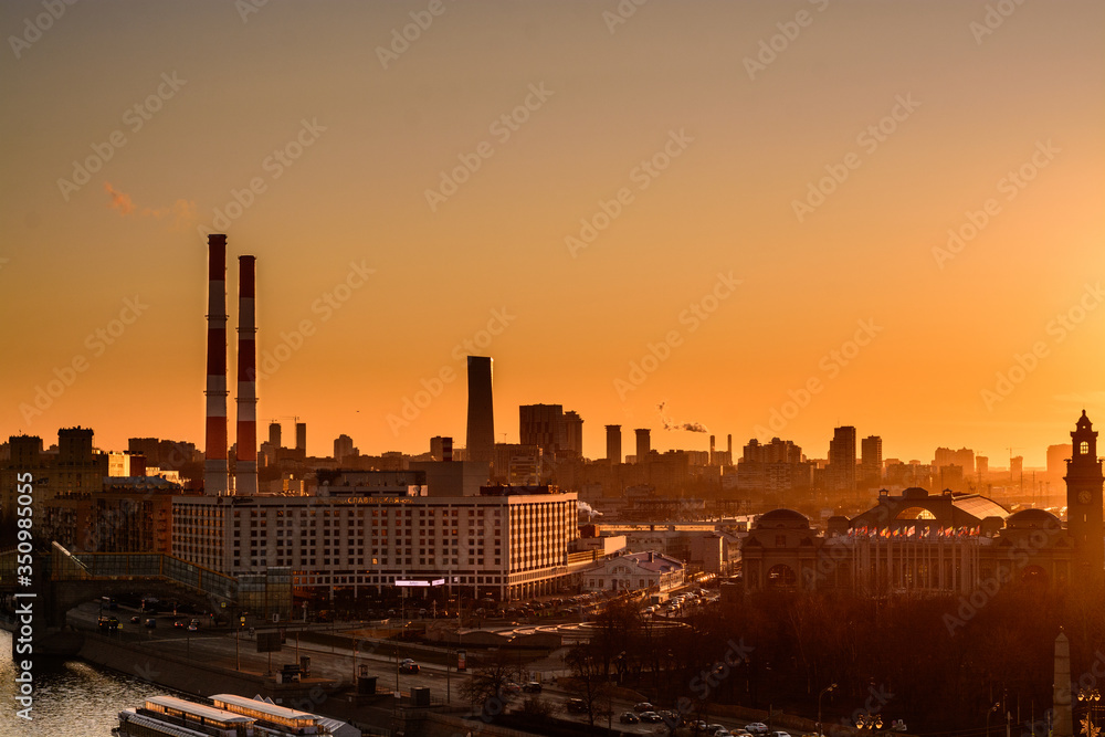 Fototapeta premium Sunset over the factories