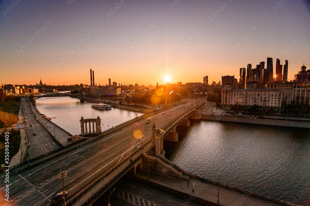 Sunset over the bridge in Moscow