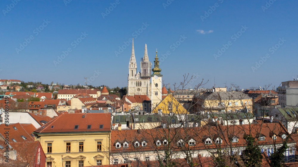 Obraz premium Zagreb/ Croatia-Apr, 5th, 2020: Gothic cathedral in Zagreb after being damaged in earthquake that broken tip of the south tower off and damaged older buildings in the historical city center