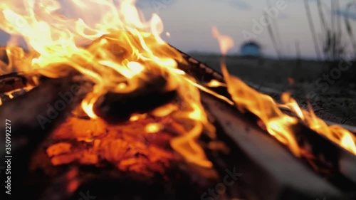A bonfire burns. Close-up of flames. Summer evening. Slow motion.