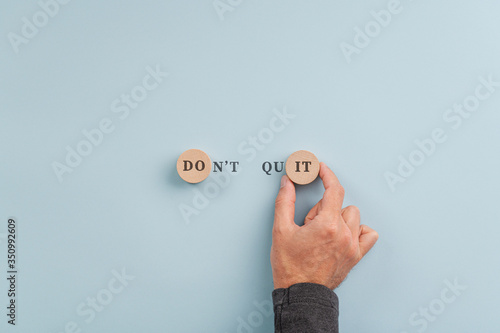 Картината върху платно Male hand making a Don't quit sign