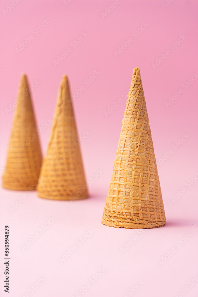 Ice cream cones summer concept with almonds, sugar Ice cream cones summer concept with almonds, sugar